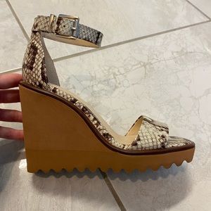 Vince Camuto wedges. Snake skin pattern. Size 6. Worn once. Excellent condition!